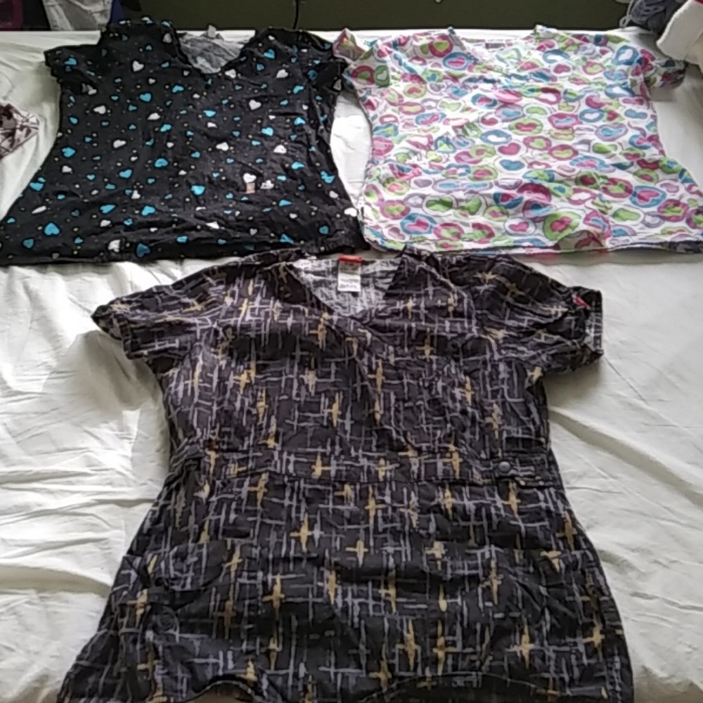 2 Large and 1 Medium Scrub tops. 3 for $50